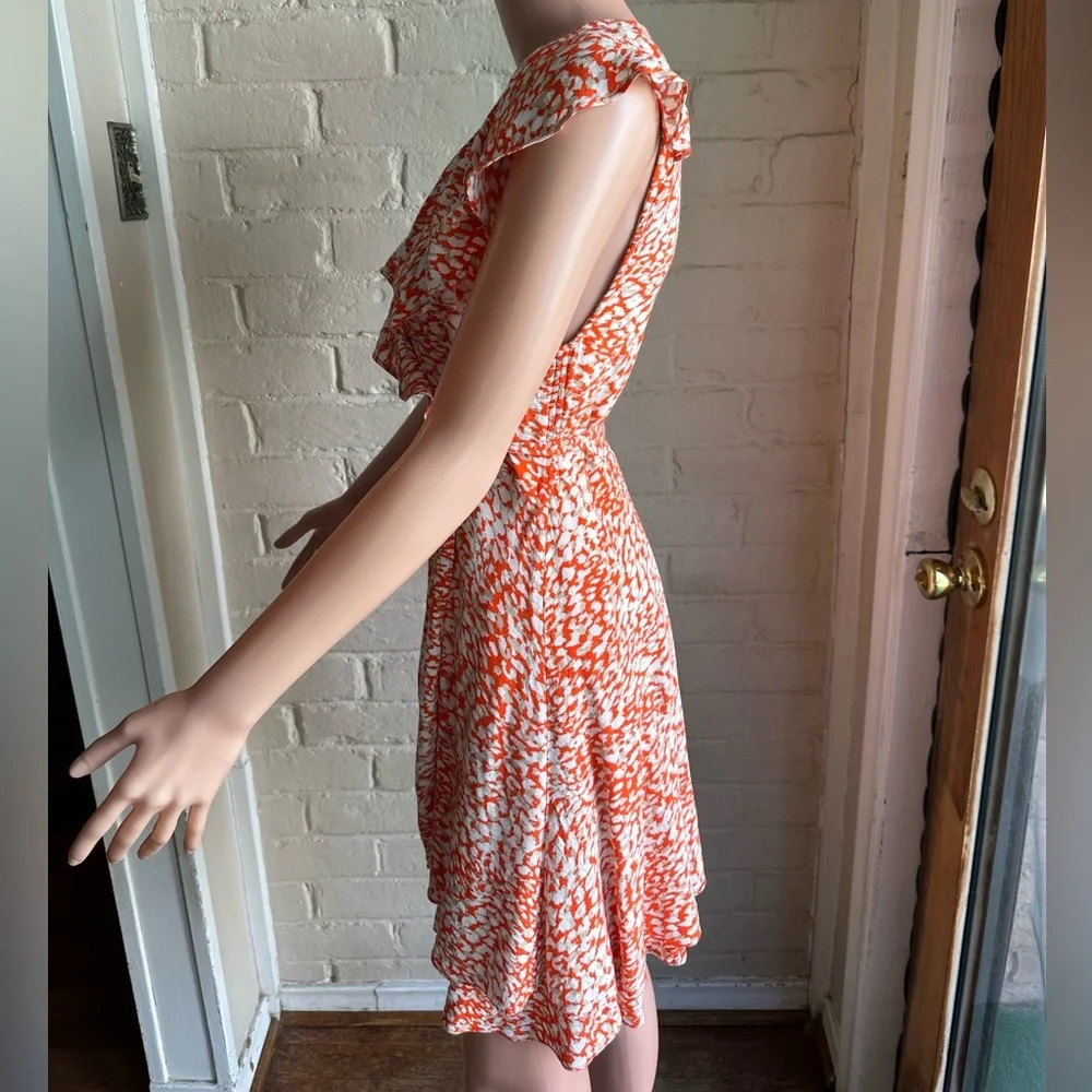 Free People size small white orange and tan animal print cute summer wrap dress